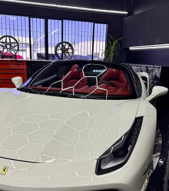 White Ferrari 488 Spider inside the SFS Bay Area facility in San Jose